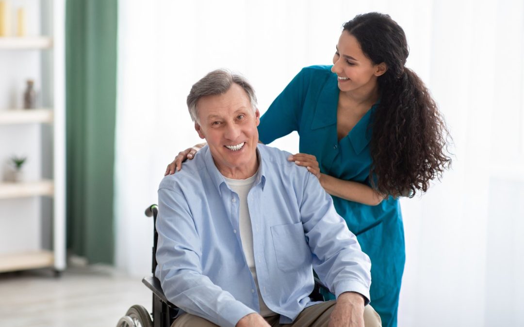A happy senior and a warm, dedicated professional caregiver