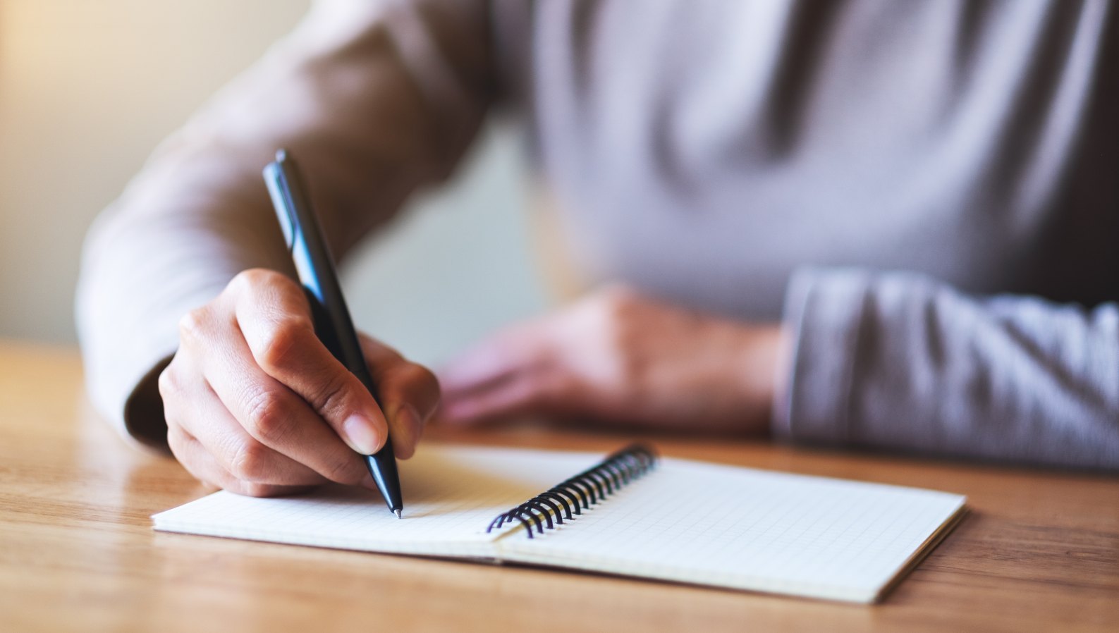 Writing notes while planning a loved ones care